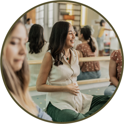 A surrogate mother (gestational carrier) taking an exercise class